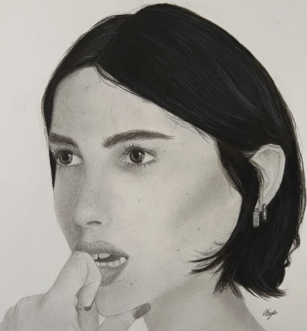 Graphite portrait of a woman with short dark hair resting a finger on her lip.